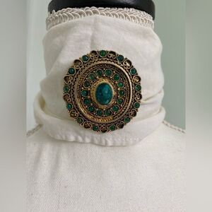Golden Pendant and brooch with Emerald Green Stones